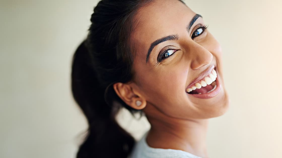 big smile girl with dark hair_